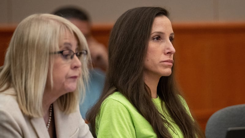 Kouri Richins appears at a sentencing hearing with her defense attorney Wendy Lewis, left, in...