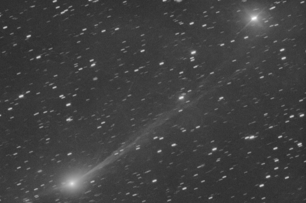 This photo provided by Gianluca Masi shows the interstellar comet 3I/Atlas as it streaks...