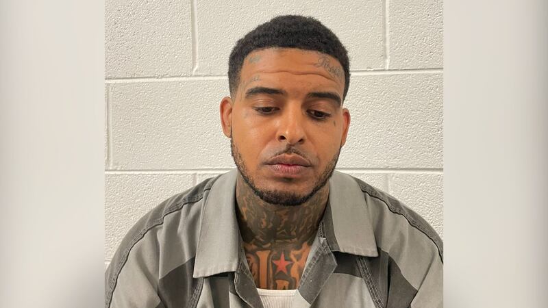 Drakar Rawlings, 31, is facing charges that include allowing access to firearms by children...