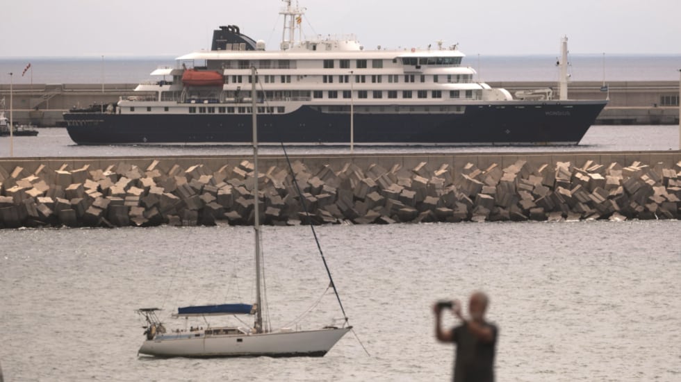 FILE -- The hantavirus-stricken cruise ship MV Hondius is seen at anchor at the port of...