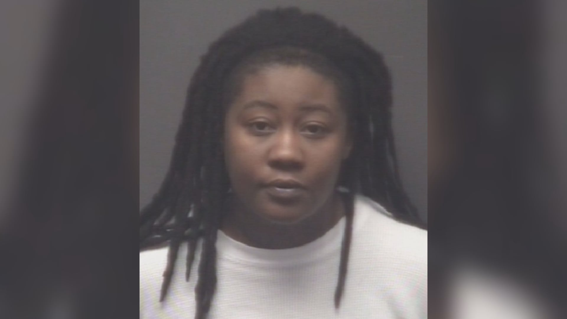 POLICE: Greenville woman arrested after hitting neighbor’s door with axe