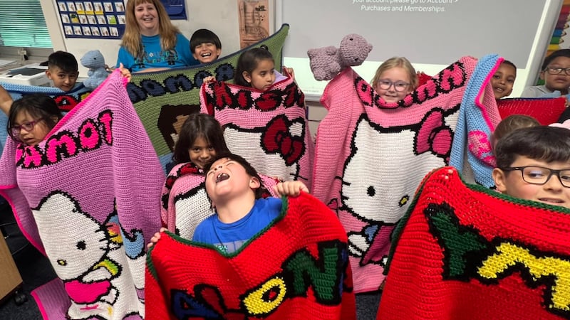 Sheila Demoret, a Dodge City teacher, crochets 19 blankets for students.