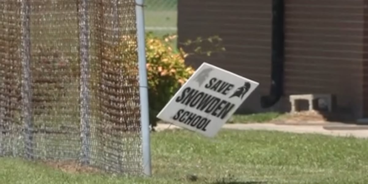 Save Sw Snowden Sign Residents express frustration on the controversial vote to close S.W ...