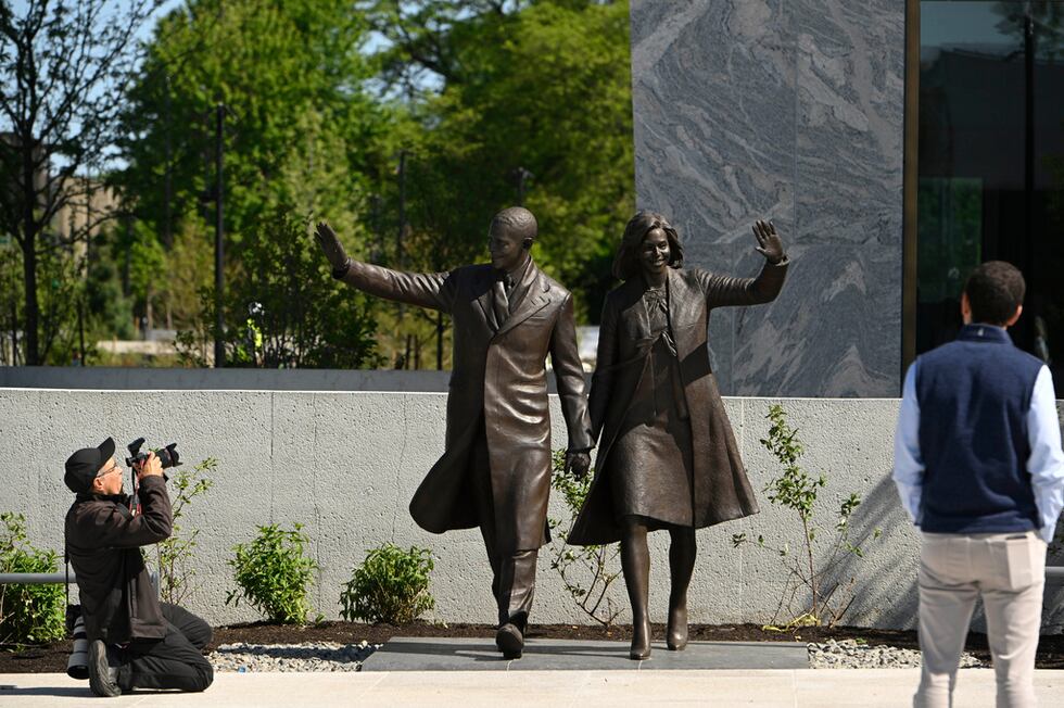Statues of former President Barack Obama and former First Lady Michelle Obama at the Obama...