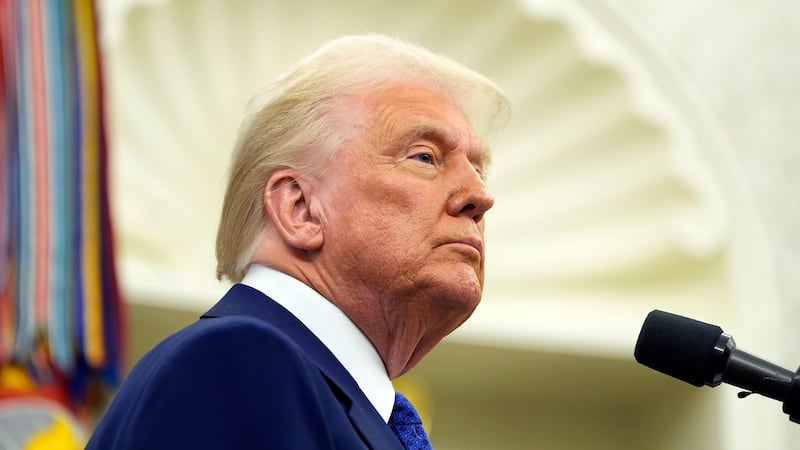 FILE -- President Donald Trump speaks as Tulsi Gabbard is sworn in as the Director of National...