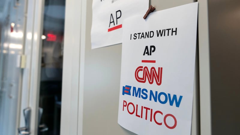A sign in support of news outlets is seen at the White House press room, Sept. 19, 2026, in...