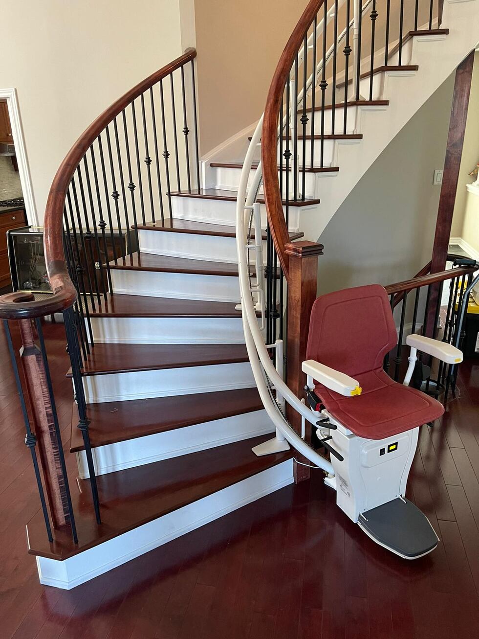 Mobility Plus | Stair life chair added to curving staircase.