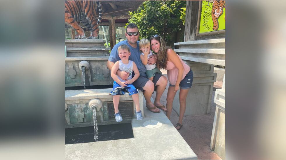 Andrew Knight, Lacey Tustin and their children.
