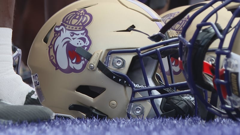JMU Football Helmet placed on the turf following a football game against Liberty on Sept. 5,...