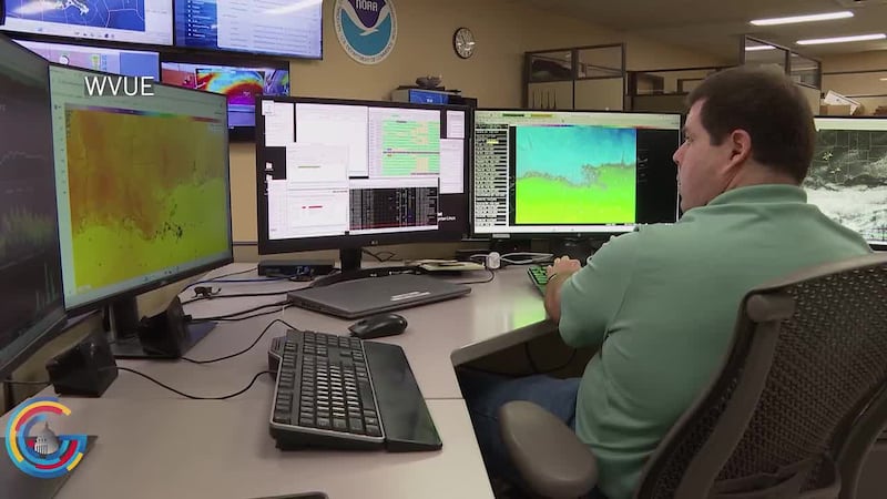 Man monitoring weather patterns